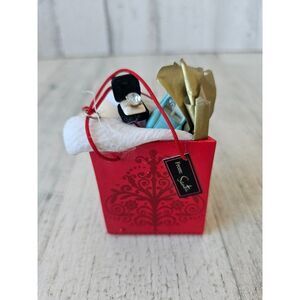 Hallmark shopping bag Santa baby magic ornament xmas tree